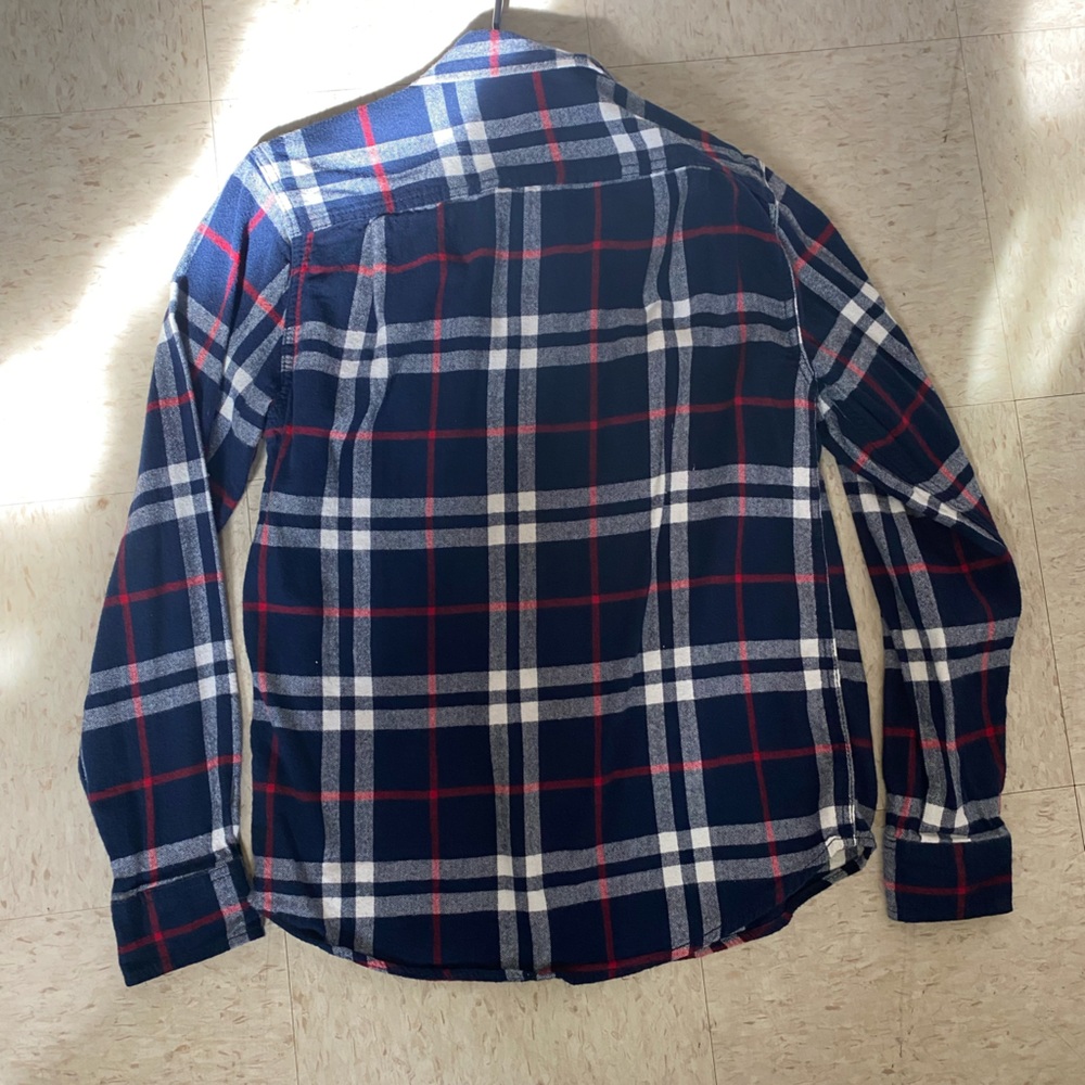 blue button down shirt with lines. size S. good condition little use
